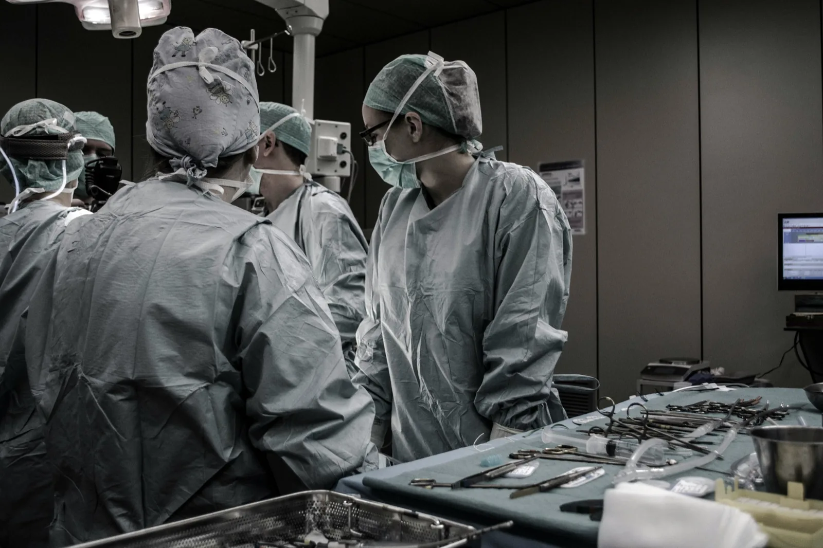A family preparing medical records for an overseas cancer treatment review.